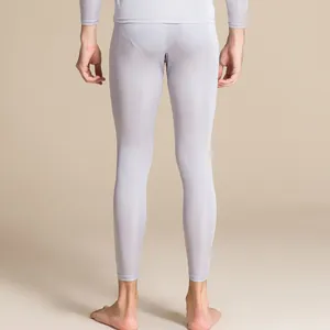 Men's silk knit thermal pants in light grey featuring a slim fit and elastic fabric