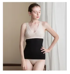 Detail of black high-waisted seamless silk knit waist warmer with fine ribbed texture