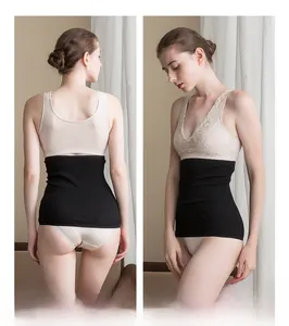 Close-up of seamless knitted silk waist warmer showing fine ribbed texture and slimming fit