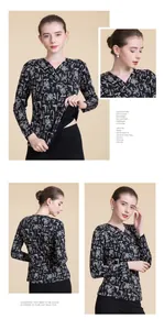 Detail of V-neck wool sweater featuring plush fleece lining and white abstract print