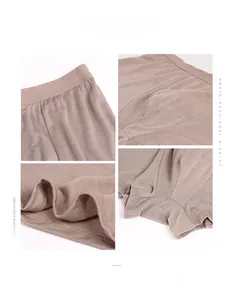 Detailed views of silk boxers featuring elastic waistband and U-convex pouch design