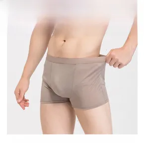 Detail of grey silk boxer briefs showing breathable fabric and elastic waistband
