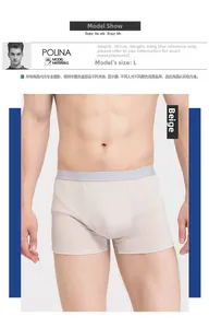 Detail of beige silk men's boxer shorts featuring a wide grey elastic waistband