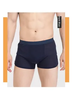 Detail view of deep blue breathable silk boxer shorts for men with soft elastic waistband