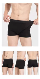 Detailed views of men's black silk boxers featuring ergonomic design and elastic waistband