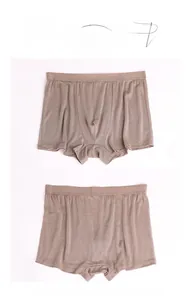 Detail of seamless one-piece back design on men silk boxer briefs for comfort