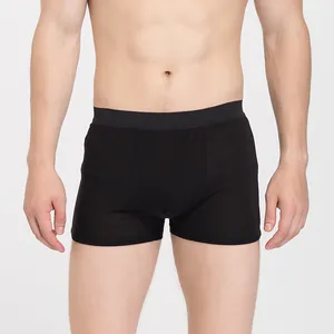 Men's silk boxer briefs in black color with elastic waistband for breathable comfort