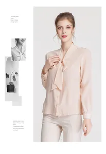 Detail of silk-like long sleeve shirt featuring elegant pussy bow and button front closure