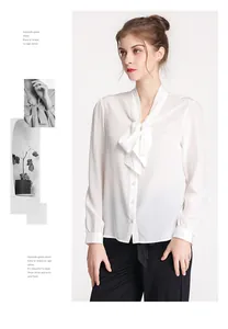 Close-up of elegant white silk shirt with pussy-bow neck and buttons for women