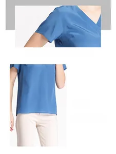 Macro shot of V-neck neckline and smooth silk fabric texture on royal blue silk blouse