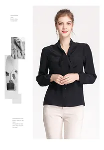 Detail of silk long sleeve shirt with elegant pussy bow neckline and buttoned front