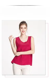 Detail shot of a wine red sleeveless silk tank top on a model with premium texture