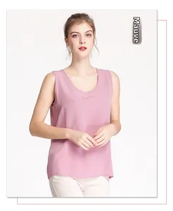Detail of dusty rose silk tank top with round neck and elegant loose fit texture