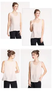 Detail view of a loose fit silk crepe tank top with round neck in light beige color