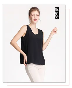 Detailed close-up of a loose-fit black silk tank top featuring a classic round neckline