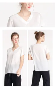 Detail of V-neck silk shirt showing fabric texture and elegant fit on a model