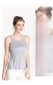 Close-up of elegant grey silk camisole with delicate lace trim neckline for women