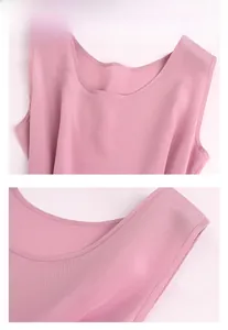 Detail view of round neck silk tank top featuring fine texture and precise stitching