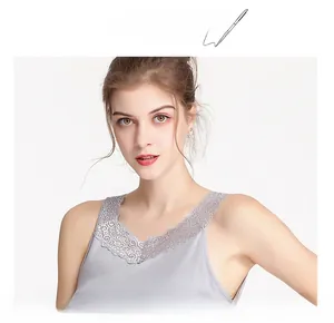 Detail of grey silk camisole with delicate lace trim and smooth satin finish