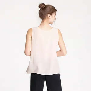 Back view of a minimalist silk crepe tank top for women in apricot with round neck