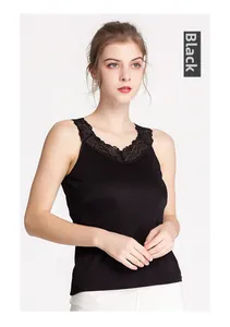 Close-up detail of the intricate black lace neckline on a silk camisole top