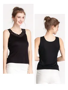 Detailed view of women's black silk camisole featuring delicate lace trim and slim fit design