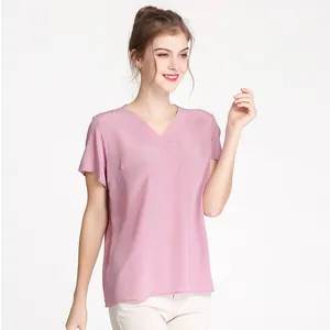 Elegant mulberry silk V-neck short sleeve top in dusty pink with ruffled cuffs and loose fit