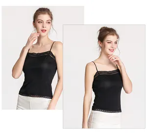 Detail of elegant black silk camisole with delicate lace trim and thin shoulder straps
