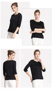 Multi-angle view of black silk knit 3/4 sleeve top with elegant boat neck fit