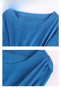 Detail shot of the double-stitched round neckline on this royal blue silk knit top