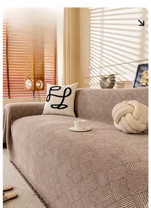 Close-up of waterproof chenille sofa cover with geometric texture in khaki