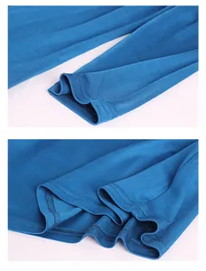 Detail view of double-needle stitching on blue silk knit sleeves and hem finish