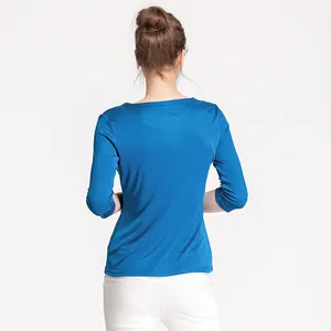 Slim fit royal blue silk knit tee with three-quarter sleeves and elegant boat neck