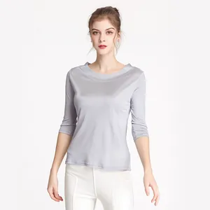 Elegant silver silk knit top for women with boat neck and three-quarter sleeves