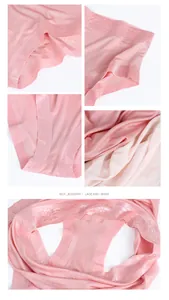 Detail of pink silk panty featuring floral lace trim and smooth satin fabric texture