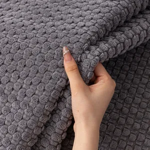 Thick grey corduroy sofa cover with non-slip popcorn texture and warm padded material