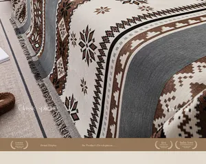 Detailansicht der Chenille-Sofadecke mit Schneeflocken-Jacquard und Fransen