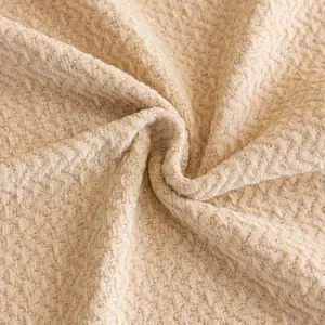 Beige wavy chenille sofa cover with thick herringbone weave and soft velvet texture