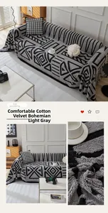 Detail of plush sherpa fleece sofa cover with bohemian geometric patterns and tassels