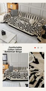 Detail of bohemian beige faux fur sofa cover featuring geometric patterns and tassels