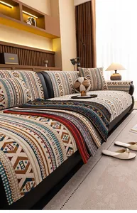 Close-up of Bohemian chenille sofa cover showing thick woven texture and geometric patterns