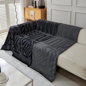 Plush bohemian geometric sofa cover in dark grey fleece for winter home protection
