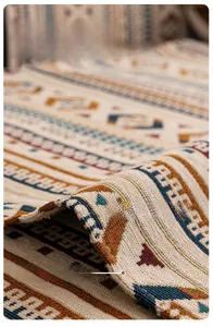Macro shot of thick bohemian chenille sofa cover showing reinforced edges and fine quilting