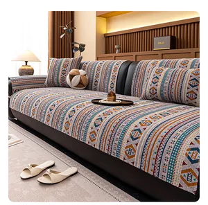 Close-up of Bohemian chenille sofa cover showing intricate geometric weaving and texture