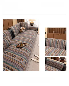 Detail of bohemian chenille sofa cover with geometric stripes and refined edge stitching