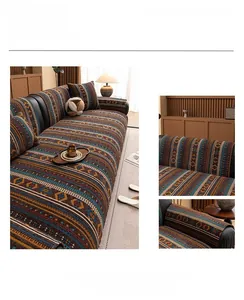 Detail of colorful brown bohemian chenille sofa cover with geometric pattern and texture