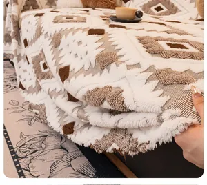 Detail of bohemian geometric plush sofa blanket showing thick texture and durable fabric