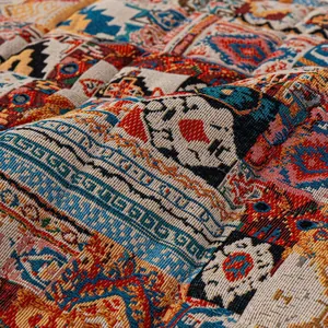 Bohemian style woven sofa cushion with colorful ethnic geometric patterns and thick texture
