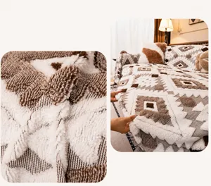 Detail of plush brown geometric bohemian sofa blanket with warm sherpa fleece texture