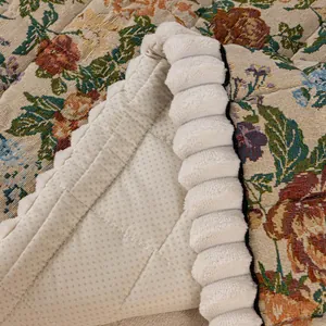Floral quilted sofa cushion featuring jacquard pattern and non-slip backing for comfort